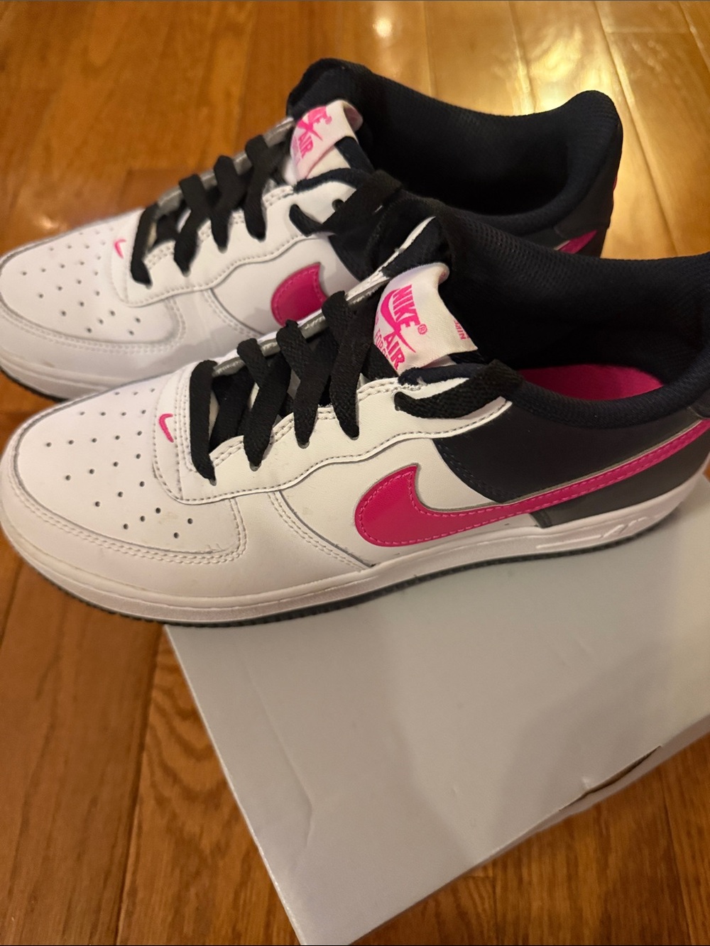 Nike Air Force 1  White Sneakers with Pink Accents and Black Laces